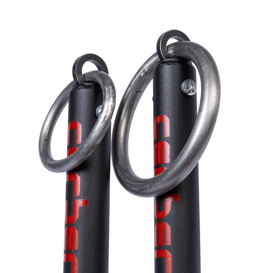 Two black ropes with metal rings and red branding on a white background